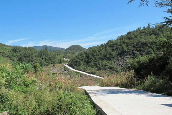 绍兴两村民自掏腰包修路因未办理审批涉罪，此事最终是如何解决的？