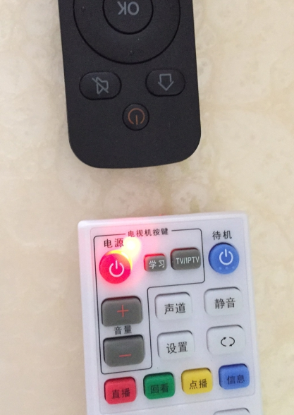 电信机顶盒遥控器怎么和电视遥控器学习?