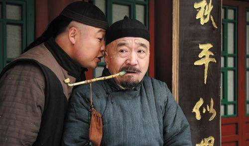 电视剧《宰相刘罗锅》的主题曲和片尾曲是什么？