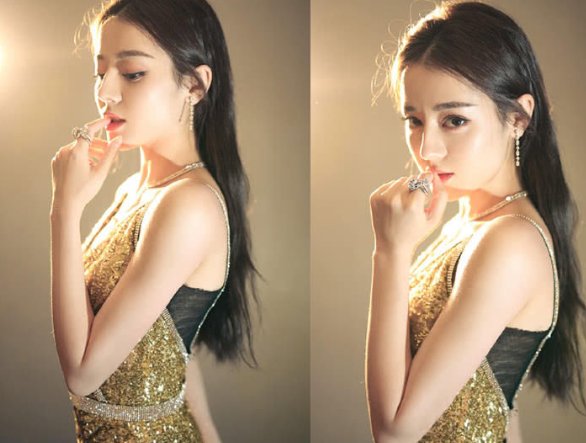 迪丽热巴身穿吊带金色鱼尾礼服出席活动，你有被她的造型惊艳到吗？