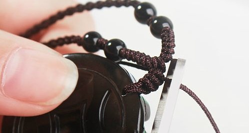 如何给玉坠打结